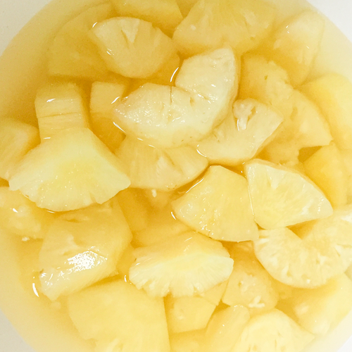 Canned pineapple broken slices in syrup